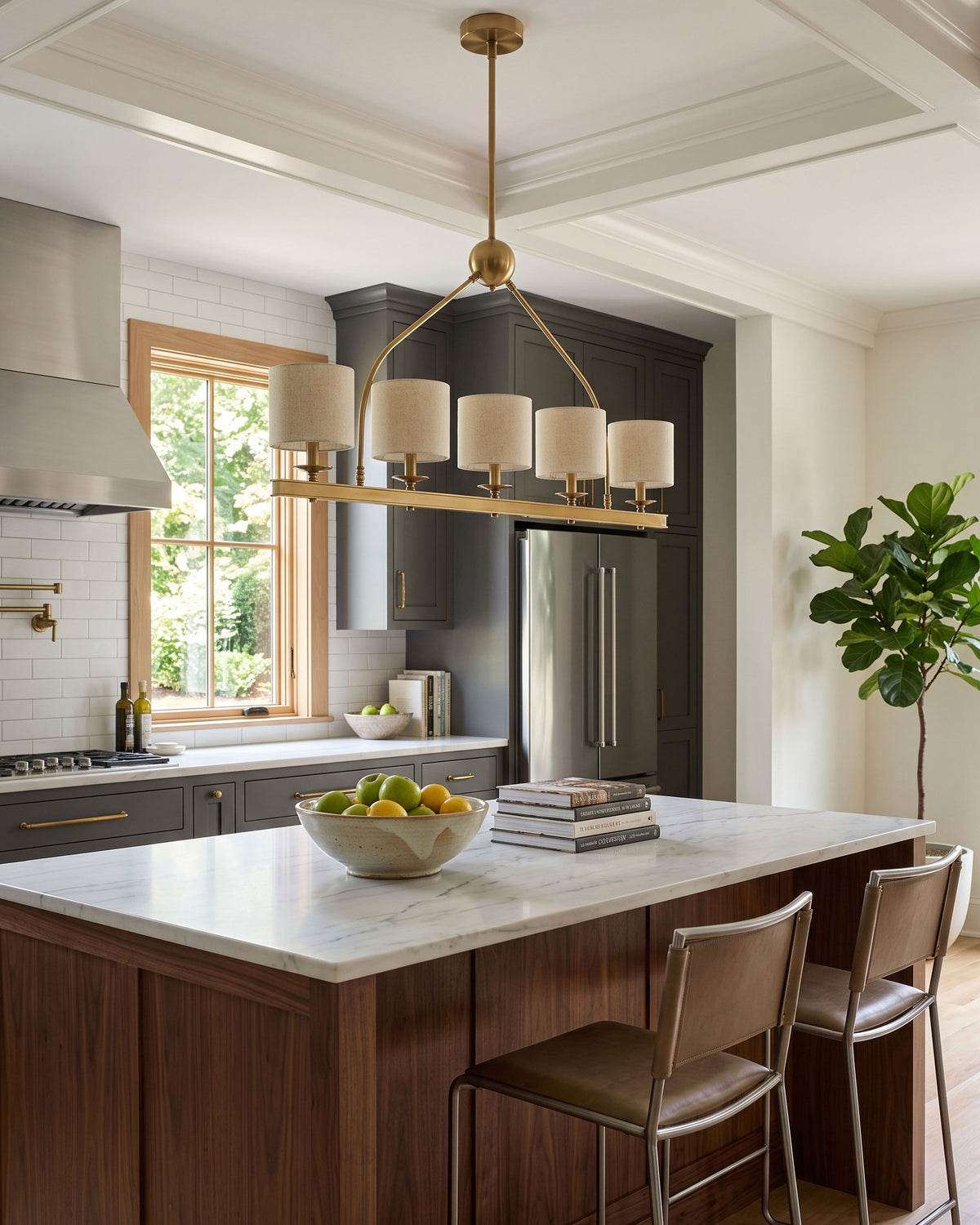 Kendrick 5-Light Linear Chandelier brass frame and finial detail